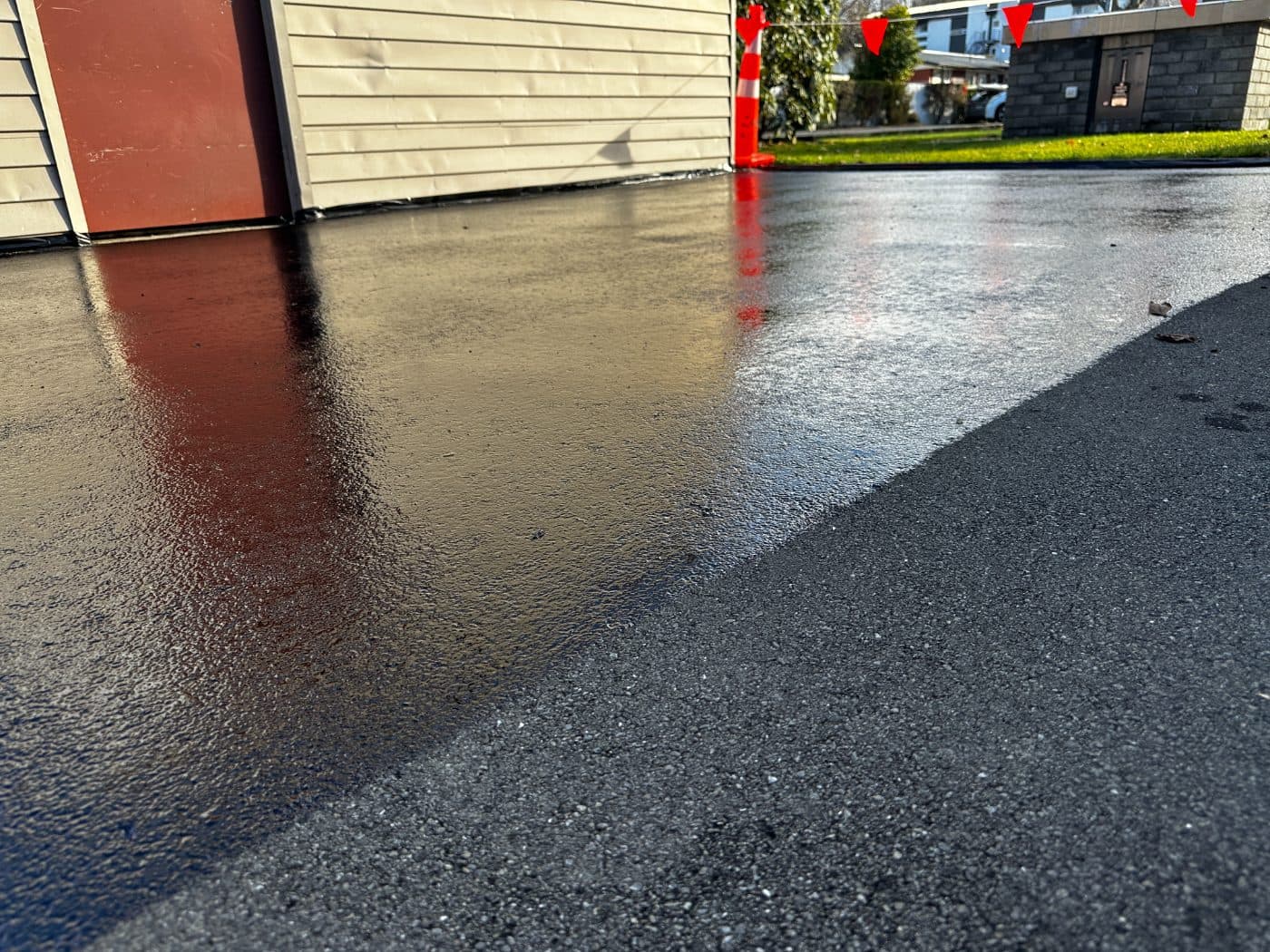 Freshly sealed glossy black surface
